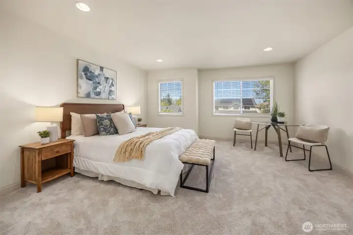 Large rec room ready to fit your lifestyle, use as a home theater, game room, or fitness space. (Currently staged as a large guest room.)