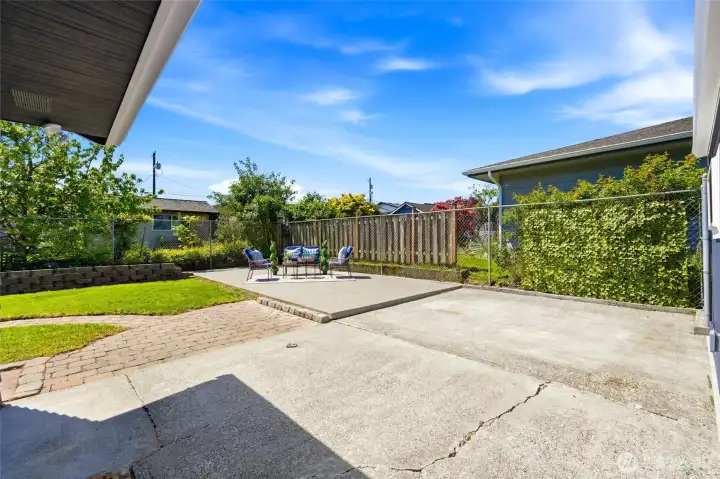 The backyard is fully fenced for privacy and usability.