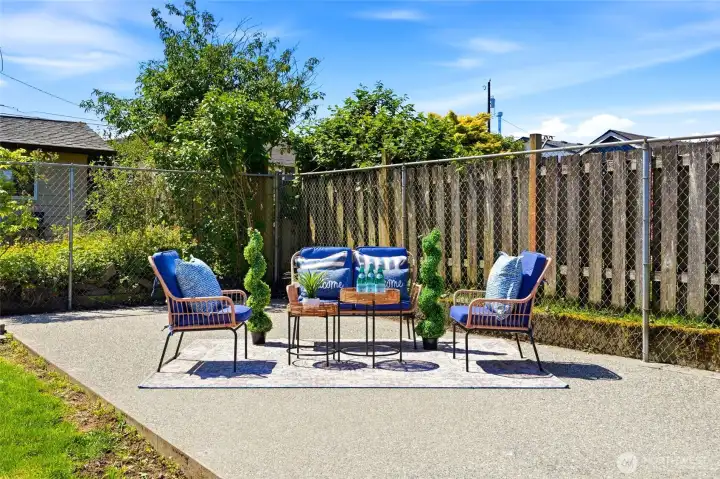 An entertainment-sized patio creates the perfect gathering space.