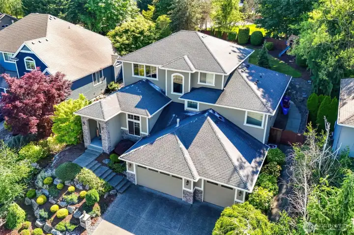 From above, the pride of ownership is unmistakable. Meticulously maintained grounds and timeless Northwest architecture create a lasting first impression.