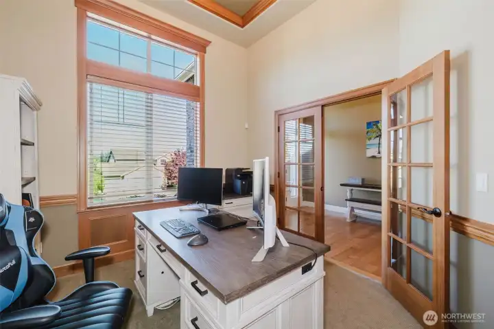 A dedicated main-floor office offers the perfect space for working remotely, studying, or managing daily life with privacy and style.