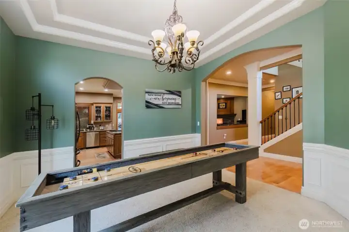 Designed for gathering, this elegant room offers endless possibilities—from formal dining and celebrations to game nights and entertaining friends.