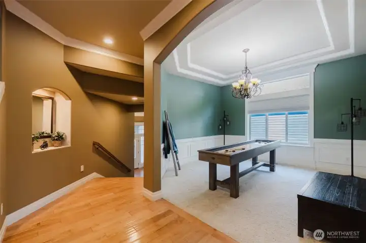 Detailed millwork, crown molding, and soaring ceilings create a sophisticated space designed for gathering and making memories.