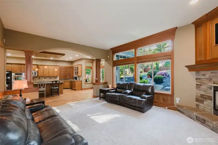 Warm, welcoming, and filled with natural light, this gathering space offers comfort, character, and backyard views year-round.