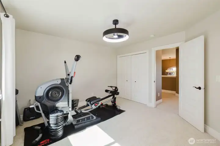Whether you envision a home gym, creative studio, office, or additional bedroom, this spacious room offers the flexibility to make it your own.