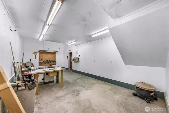 Shop could be repurposed as theatre room or ADU, extra storage room off the shop.