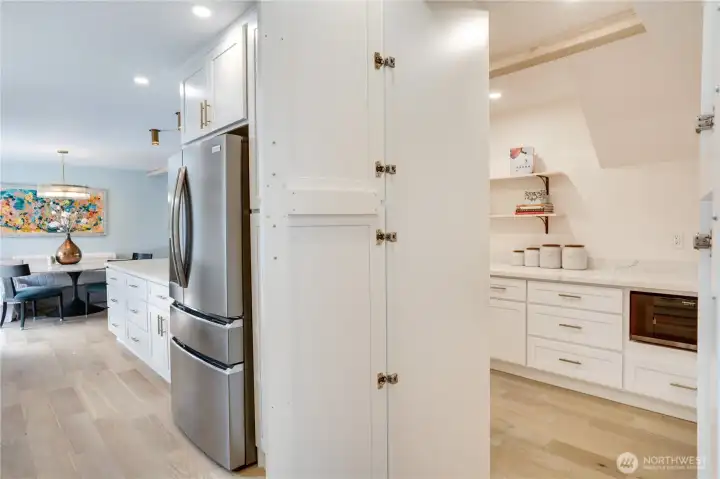 The walk-in pantry is tucked discreetly behind the kitchen — a dedicated prep and storage room that most homes at twice the price don’t offer. The walk-in pantry is tucked discreetly behind the kitchen — a dedicated prep and storage room that most homes at twice the price don’t offer.