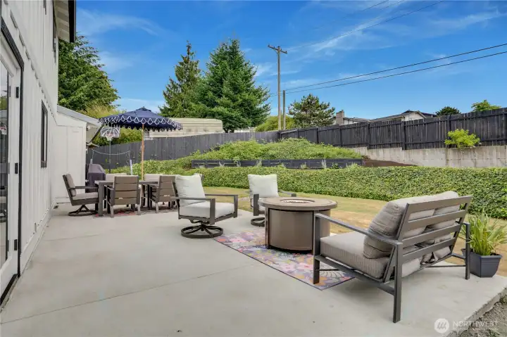 French doors from the dining nook open directly to the concrete patio — the indoor-outdoor connection this neighborhood rarely offers. French doors from the dining nook open directly to the concrete patio — the indoor-outdoor connection this neighborhood rarely offers.