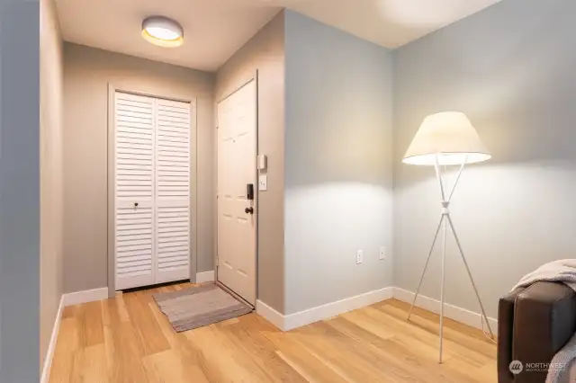 New vinyl plank flooring and the living room is the first room you encounter.