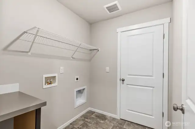Photo is of a similar home. Colors and materials may vary.