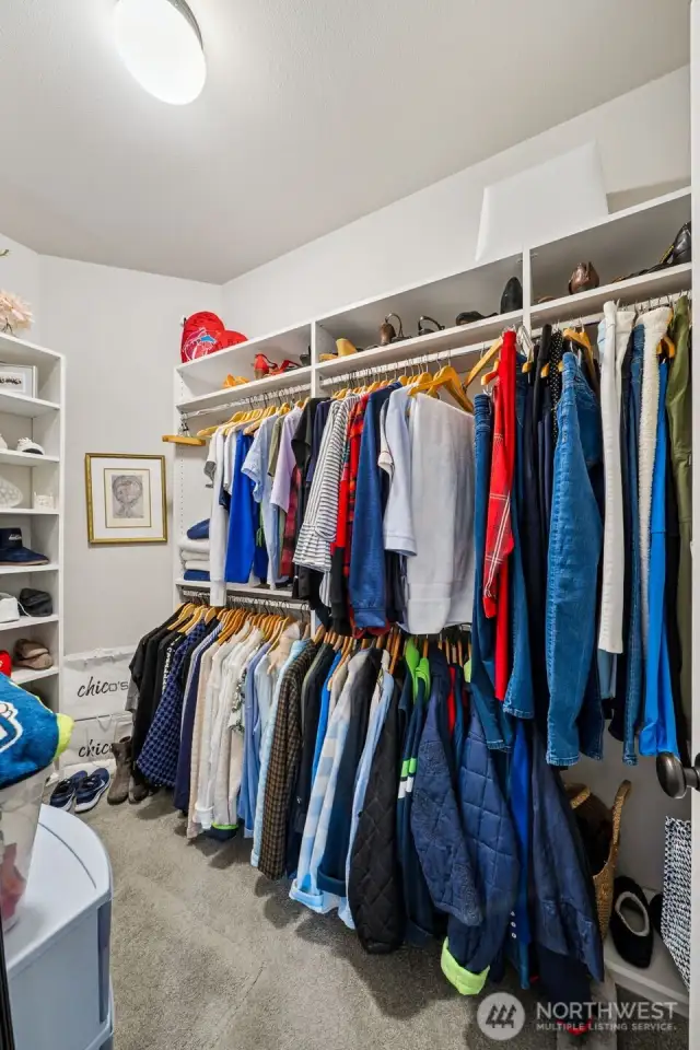 Custom designed closet organizer for the Primary Bedroom