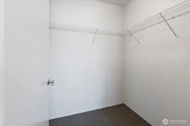 Large walk-in closet in Primary Bedroom