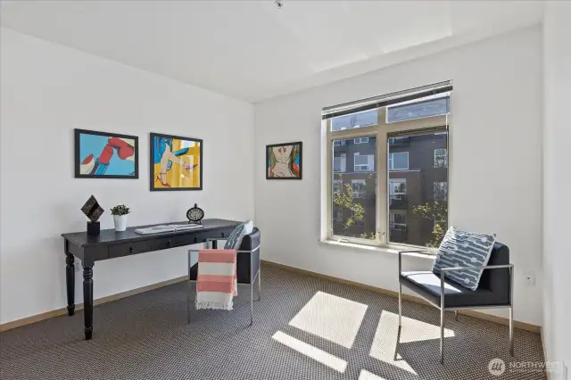 The 2nd bedroom with adjacent full bathroom.  Great as a home office or guest suite.