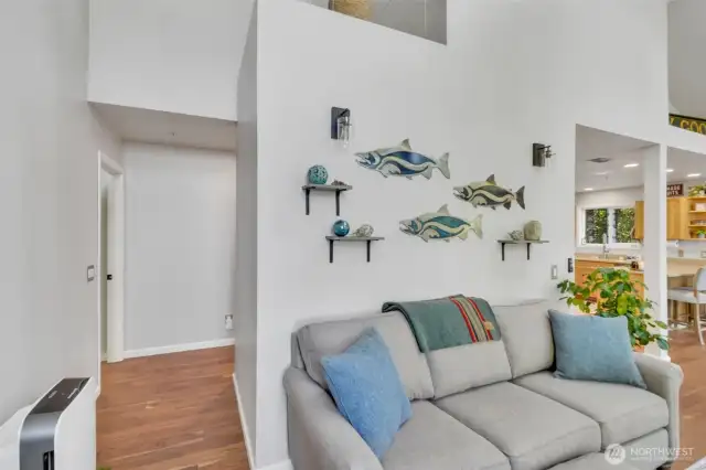 Living room and attic entrance above.