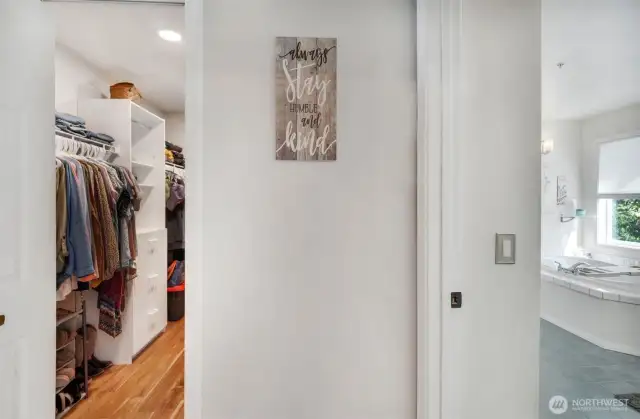 Primary bedroom walk in closet.