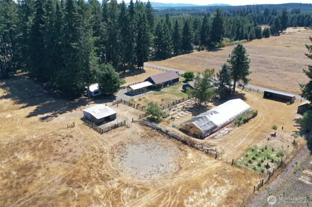 Aerial view of front of property looking southeast, property is fully fenced and cross fenced for all your animal needs!