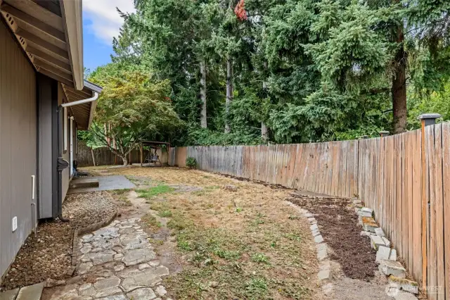 Gated and fenced backyard.
