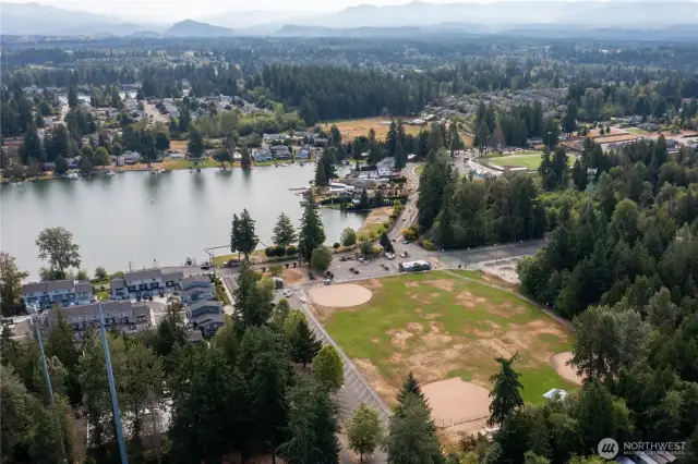 Public Allan Yorke Park w/Lake Tapps public access, skate park, ball fields, picnic areas and snack bar.