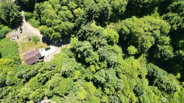 Drone view of land and nextdoor neighbor