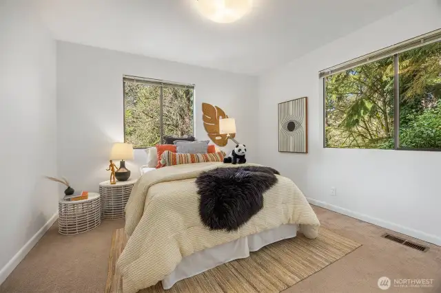 Bedroom two of three on the same floor brings in north and east facing light.
