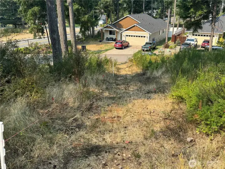 Driveway easement to the Timber Lane cul-de-sac. Approx, 12' in width.