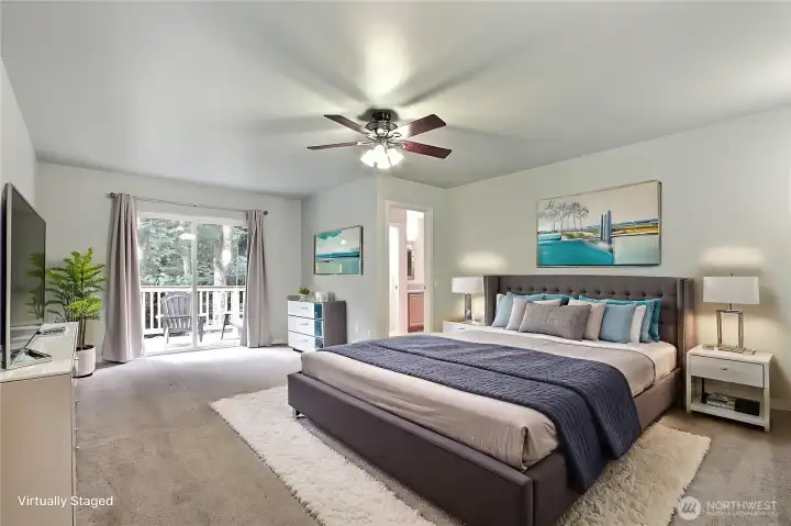 Primary bedroom suite view, generous is size, I really love the patio doors leading to your brand new deck. ***Virtually Staged***