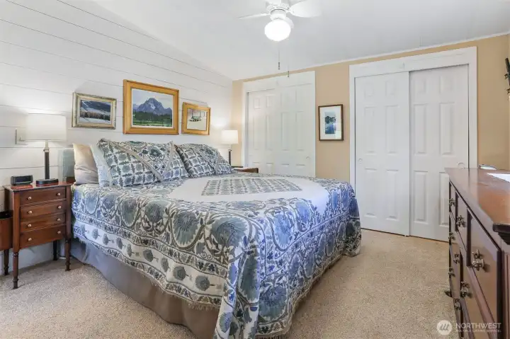 Master bedroom suite overlooks the community pond and greenbelt.  Double closets, vaulted ceilings and a remodeled full bathroom with a walk in shower