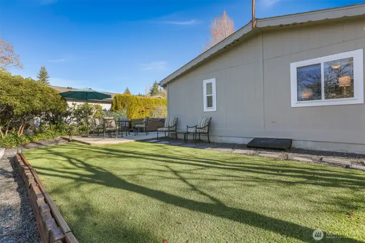 Back yard and patio with a turf lawn (No Mowing and always green!!)
