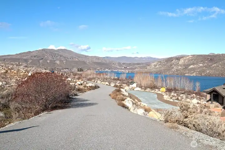 Looking North along the road between the lots.