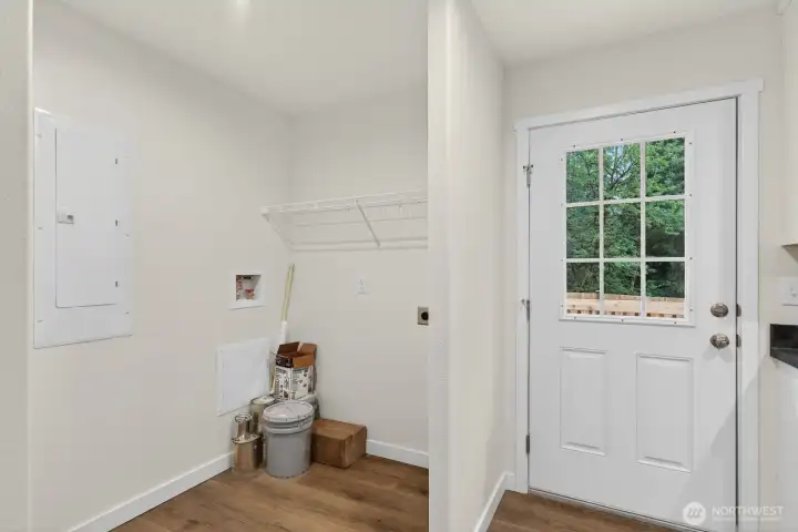 Back door leads to deck and fully fenced back ard