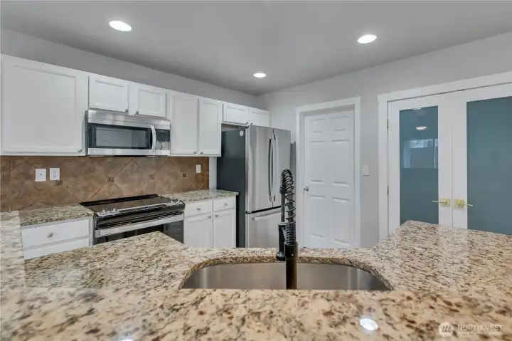 Versatile kitchen with lots of storage.