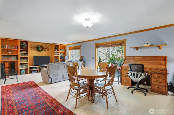 The kitchen dining area can host a large table set, in addition to the formal dining room