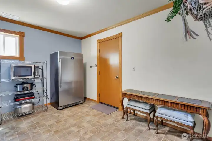 Now THIS is a bonus room! Currently used as a pantry, this space can serve as a Costco room, a mudroom and a pantry. You could even use it as a craft space!