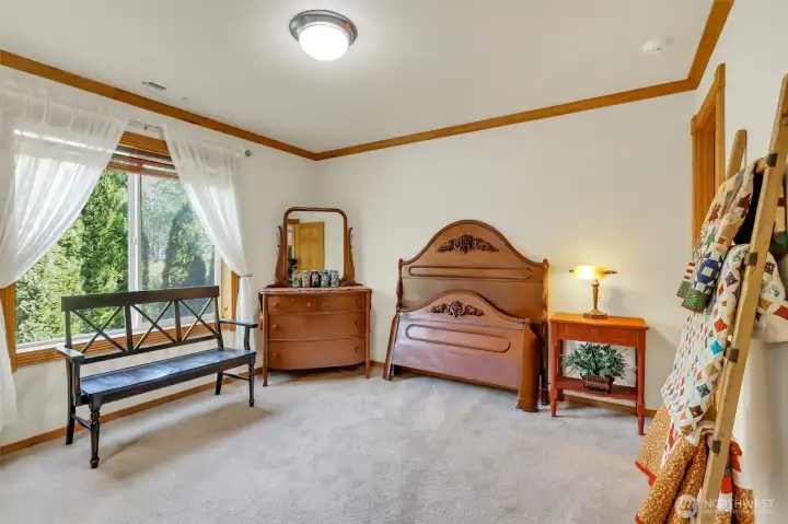This main floor bedroom is perfect for a guest room or multi-generational living