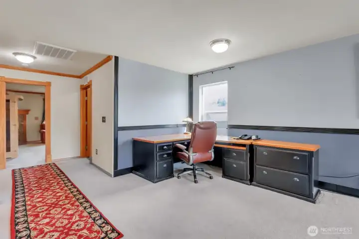 The bonus/media room upstairs also has a great space for an office or homework station