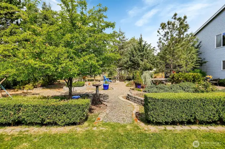 An amazing mix of lush grass and beautiful gardens