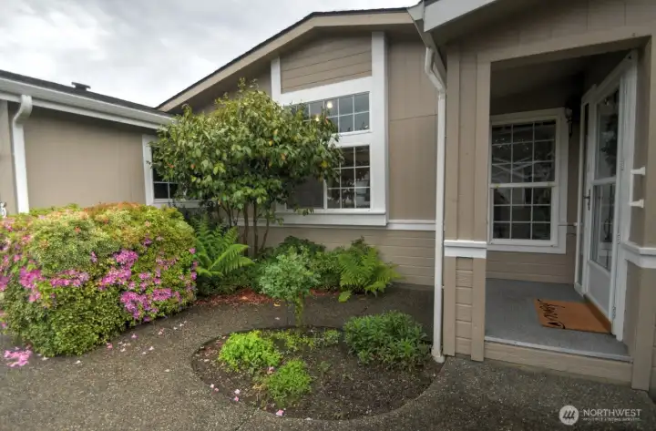 Welcome Home! A covered porch greets friends and family...wait until you see inside this turnkey home