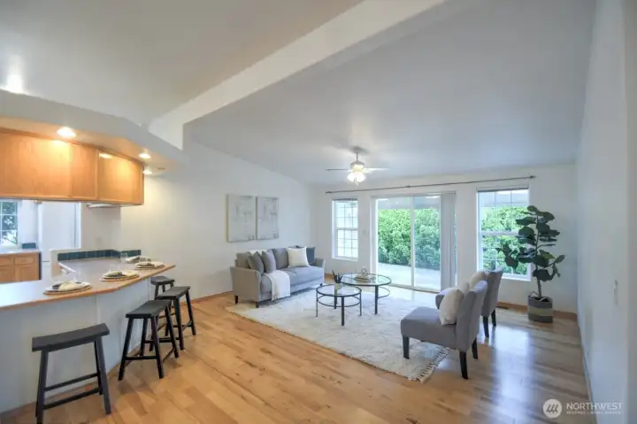 View of the countertop bar seating that flows into the family room