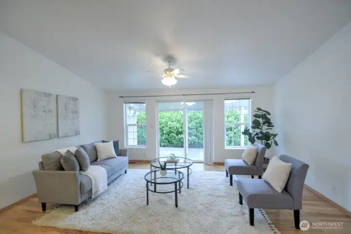 Bright, open family room with sliding glass doors to the back patio