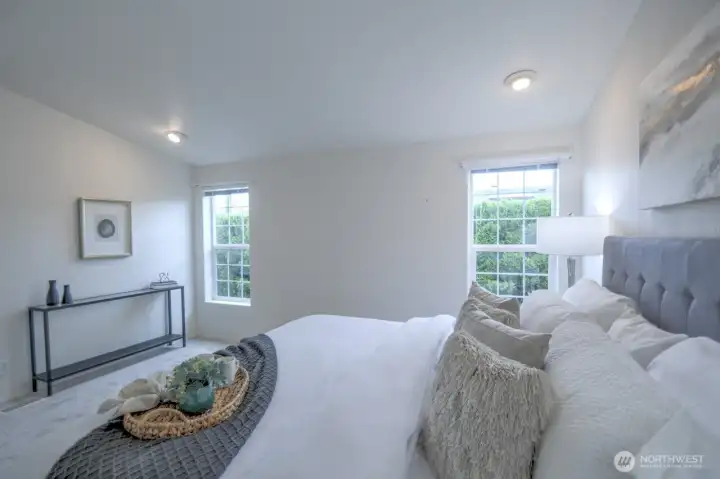 Another view of the primary bedroom