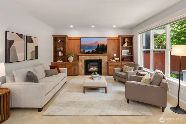 Great room with beautiful views of the backyard and a second fireplace