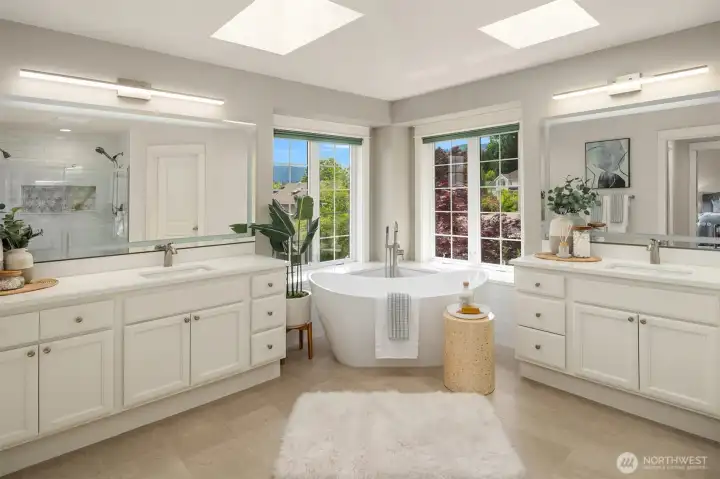 Primary bathroom with stunning soaking tub and oversized shower remodeled in 2025
