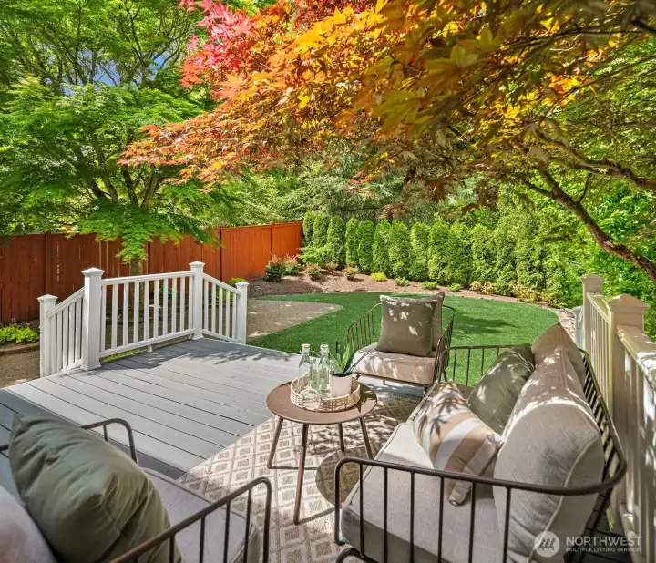 Stunning deck with lush and private yard