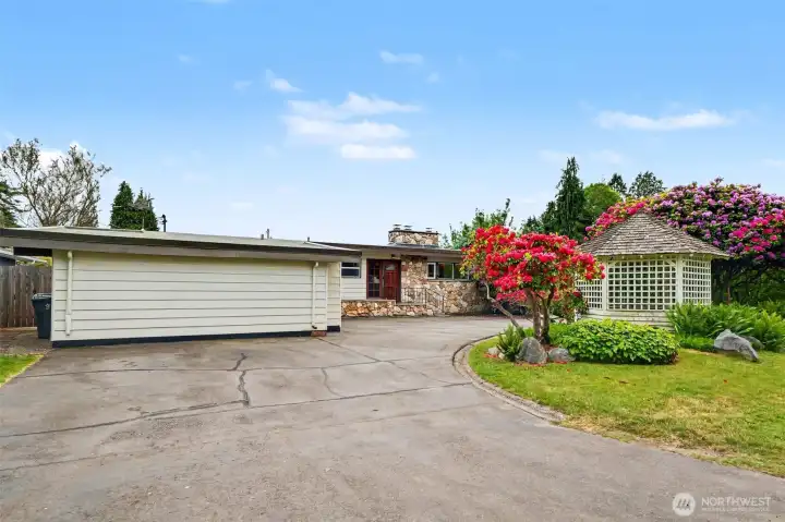 Large Driveway Allowing Additional Parking and Potential RV Parking