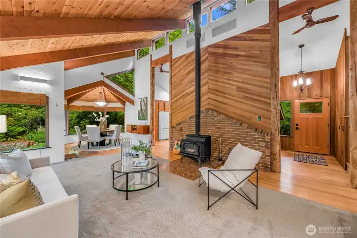 Plenty of windows for best summer and winter light. Custom-built wood entry and exterior doors, with special-order glass, reflect the thoughtful design and quality found throughout this unique home. Plenty of windows for best summer and winter light. Custom-built wood entry and exterior doors, with special-order glass, reflect the thoughtful design and quality found throughout this unique home.