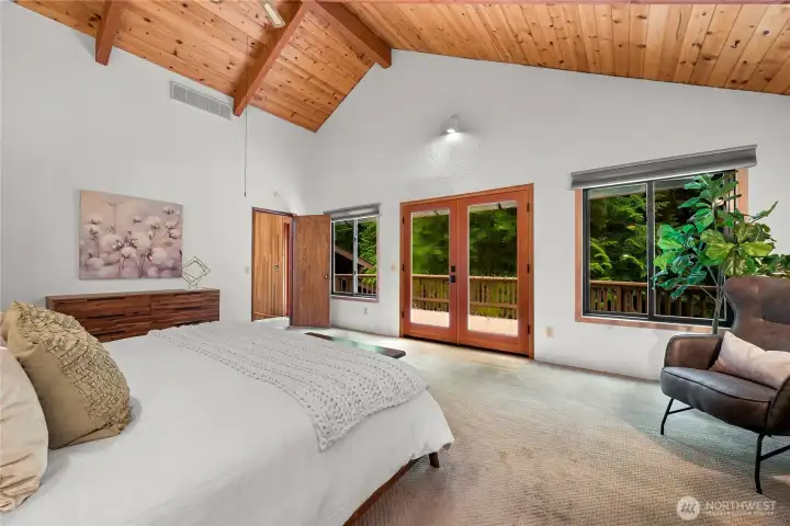 Primary Bedroom, French Doors lead to Front Deck Primary Bedroom, French Doors lead to Front Deck