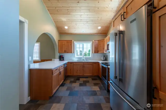 Fully remodeled kitchen with SS appliances and quartz counters.