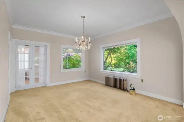 Over-sized dining room with elegant chandelier