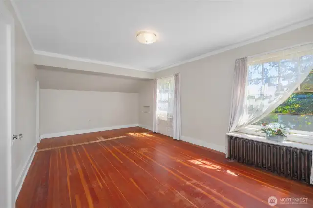 Primary upstairs bedroom with lovely hardwoods