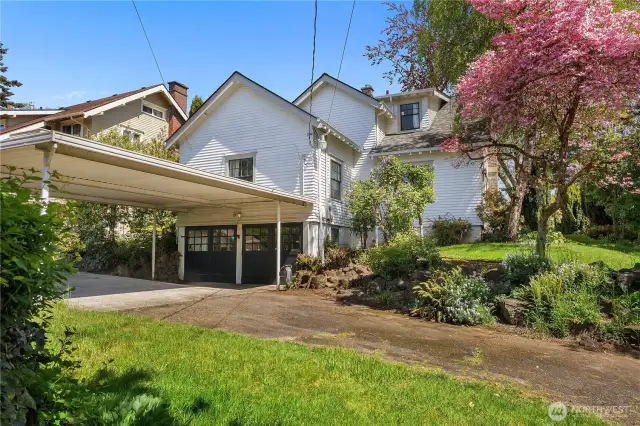 Long driveway and double car carport.